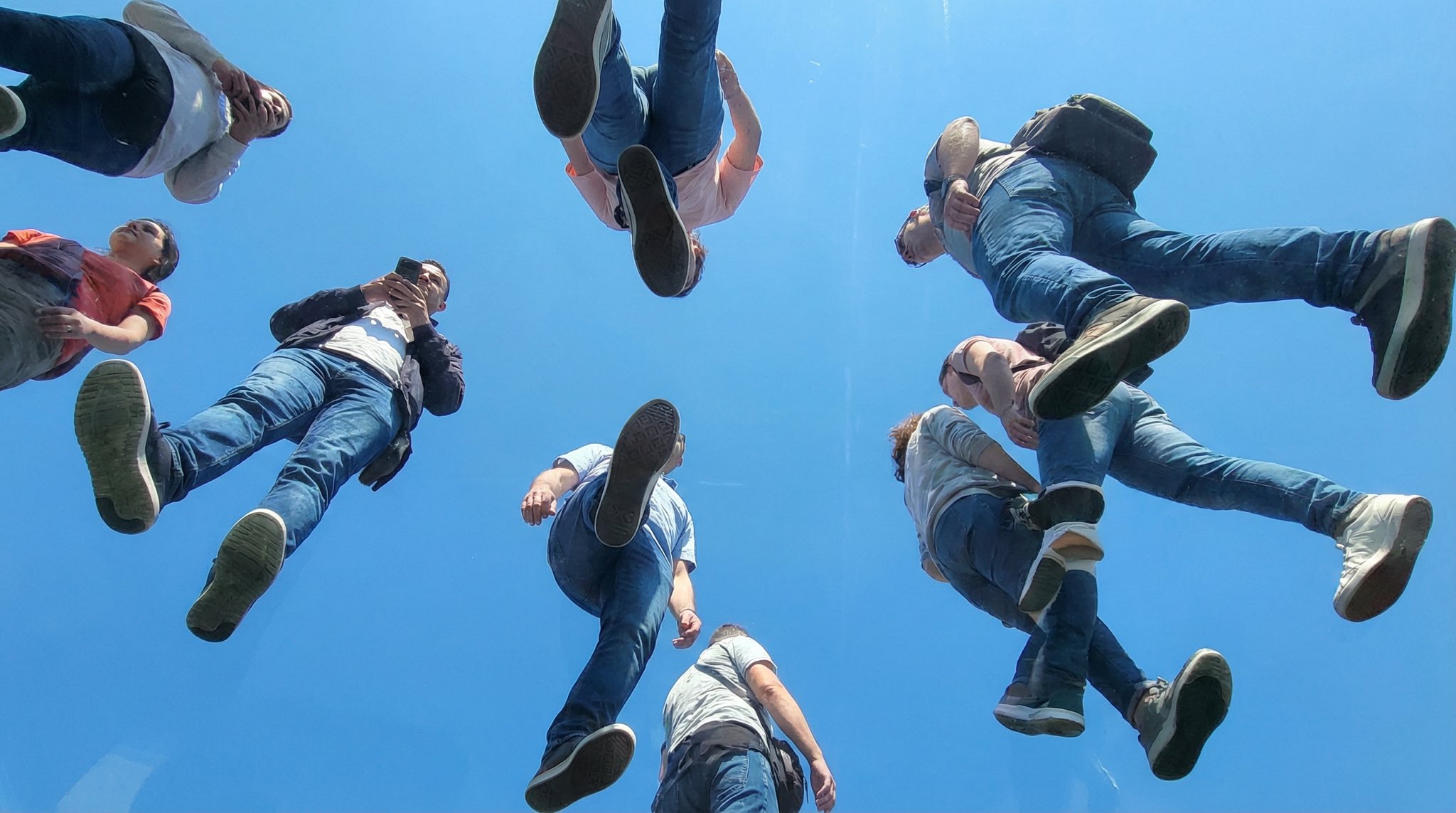 View from under a plane of completely transparent plexiglass. We are looking str… (4)