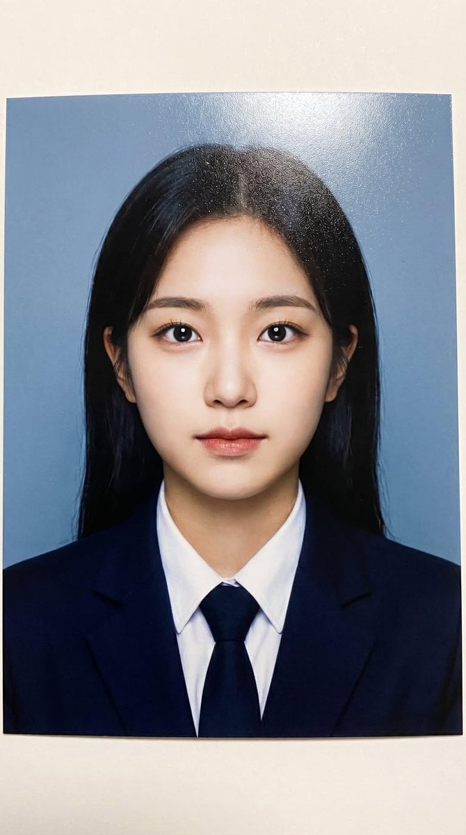 Photorealistic printed portrait of a young woman using the exact same face from … (2)