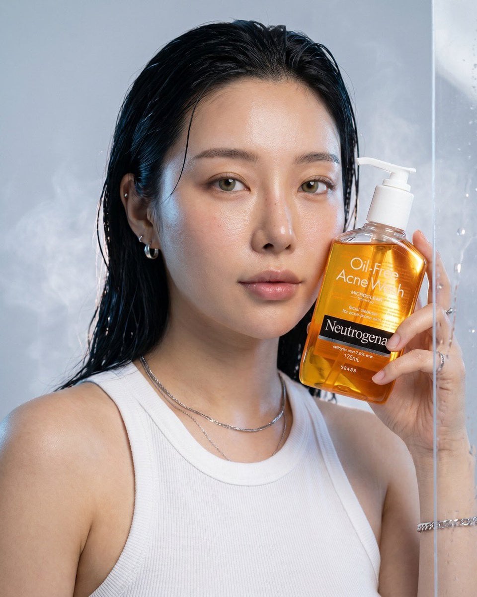 Ultra-realistic luxury skincare advertisement for Neutrogena Oil-Free Acne Wash,…