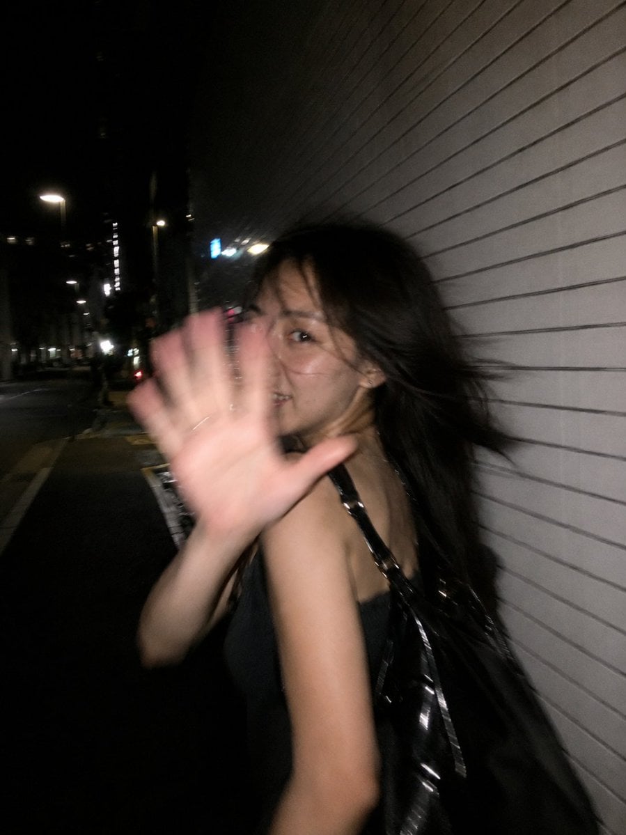 Ultra-realistic candid smartphone flash photograph, portrait orientation, 3:4 as…