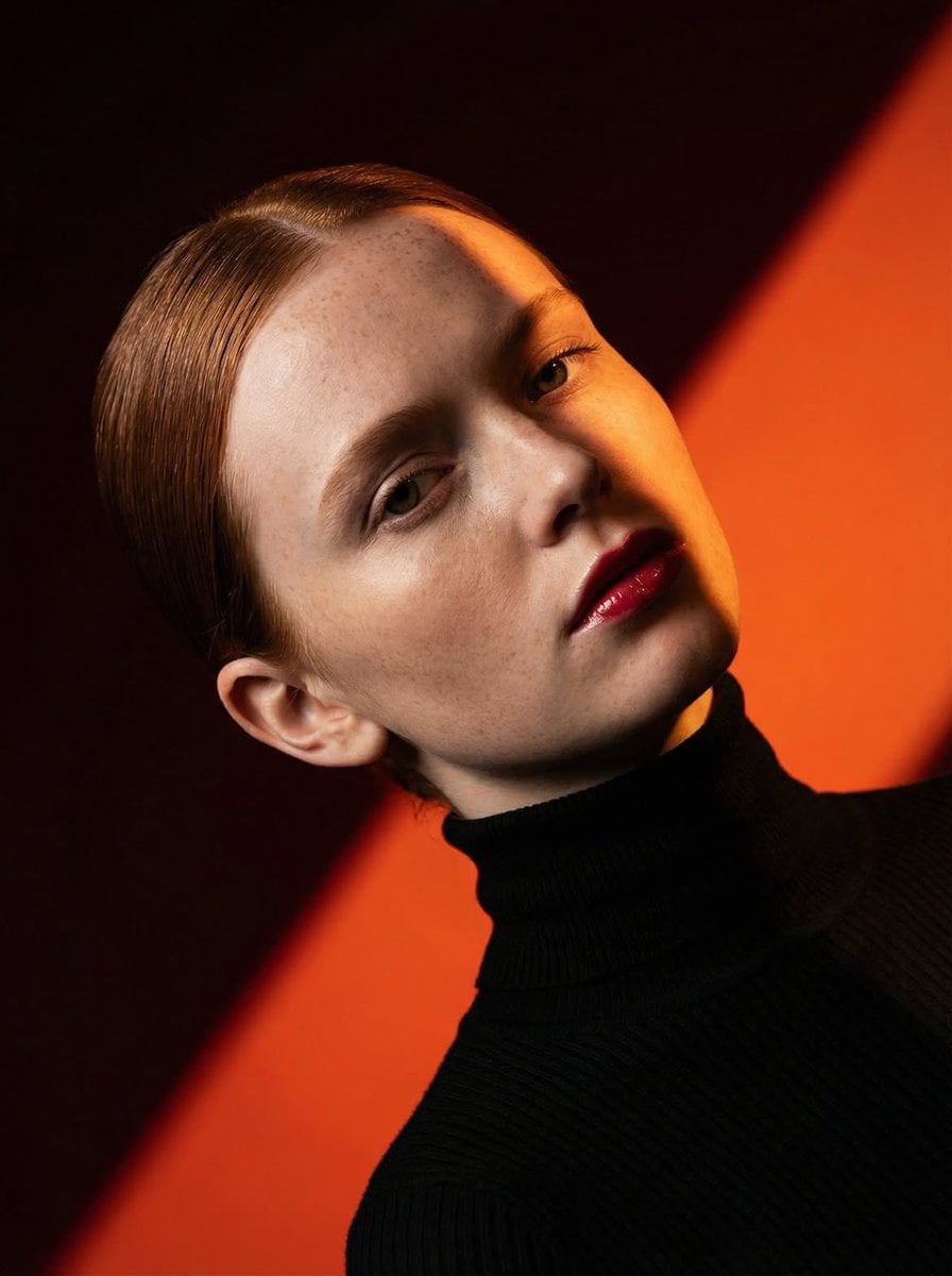 Ultra-high-fashion editorial beauty portrait of a fair-skinned female model with…؛ پرامپت فارسی برای ساخت عکس با هوش مصنوعی